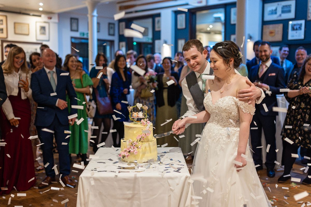 "Sweet moments and a love to savor, together we cut the first slice of forever 🍰💕 #CakeCutting #SweetBeginnings #WeddingBliss"