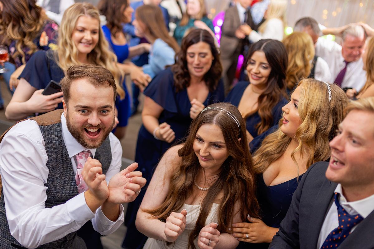 "Dancing into forever with the ones we love the most 💃🕺🎉 #WeddingCelebrations #LoveAndLaughter #MemoriesToCherish"