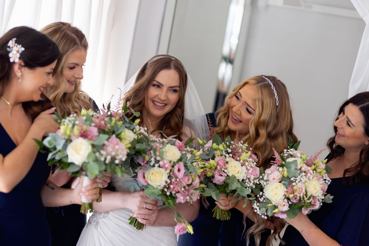 "A circle of sisters, hearts entwined, standing by her side as love is enshrined 💐💕 #Bridesmaids #WeddingBond #ForeverFriends"