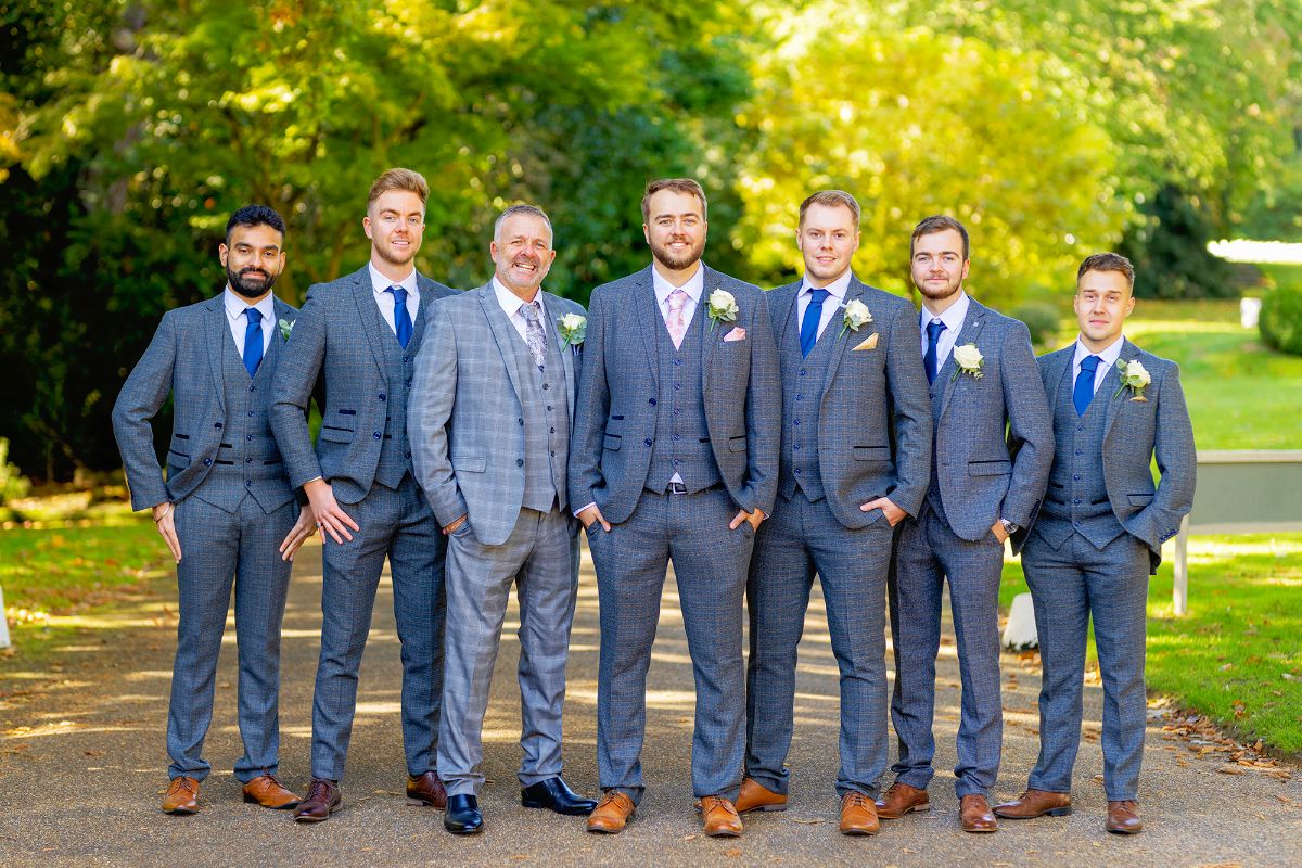 "Brotherhood of love and support, standing strong on this special day 🤵🕺💙 #Groomsmen #WeddingBond #FriendsForLife"