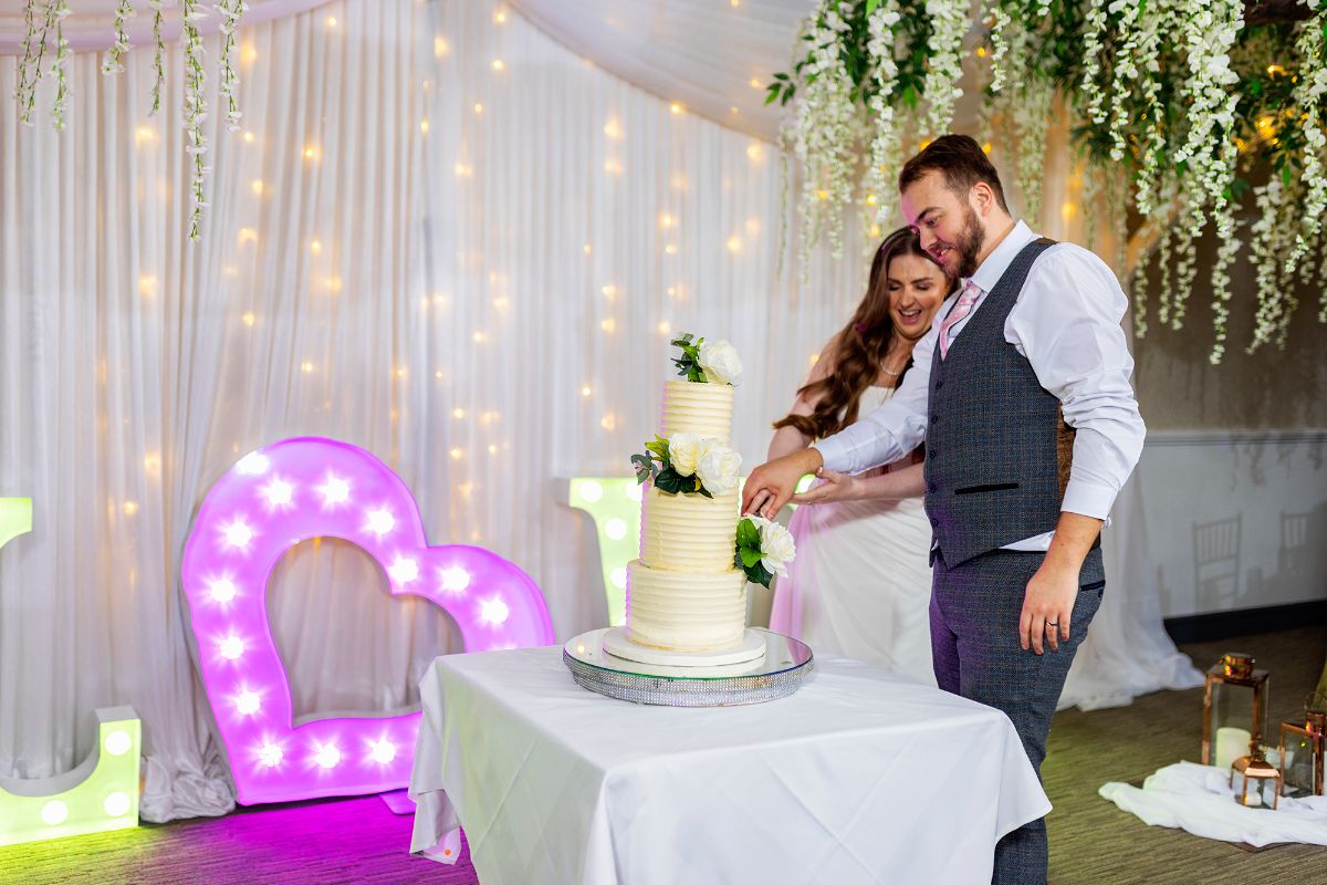 "Sweet moments, forever shared 🍰💕 #CakeCutting #LoveInEverySlice #HappilyEverAfter"