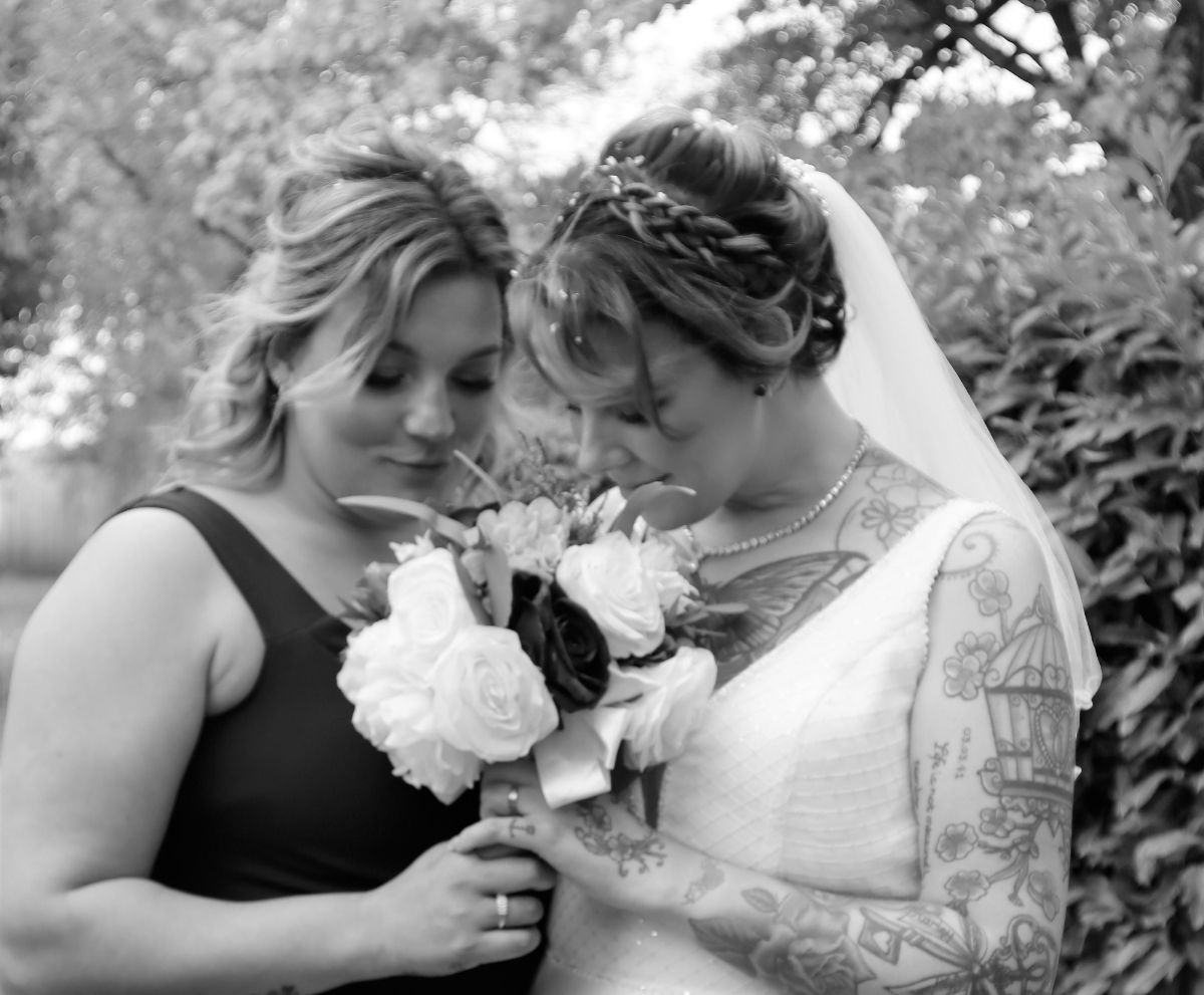 Bride and bridesmaid