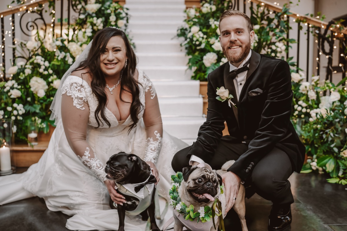 Bride and Groom with their pugs