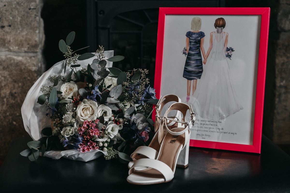 Detailed photo of Brides flowers and shoes