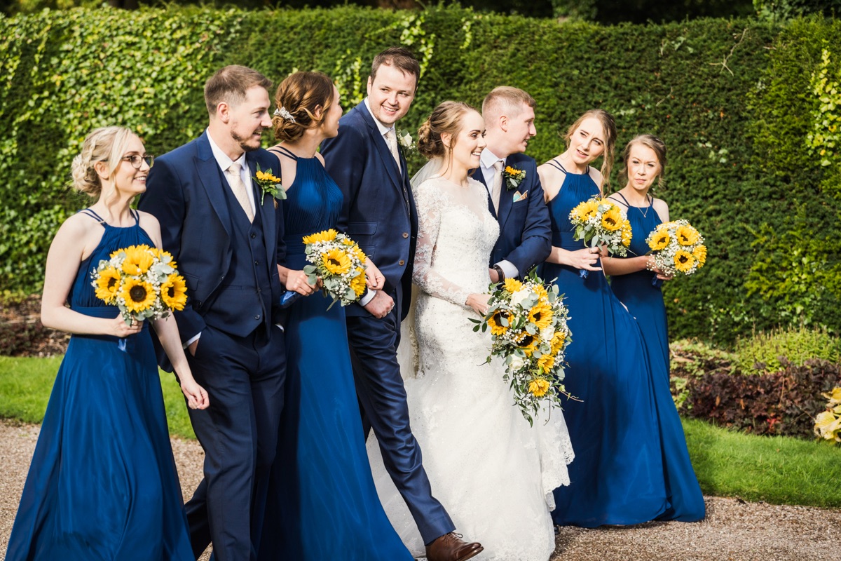 The navy dresses and vibrant sunflowers looked fabulous in the low sunlight