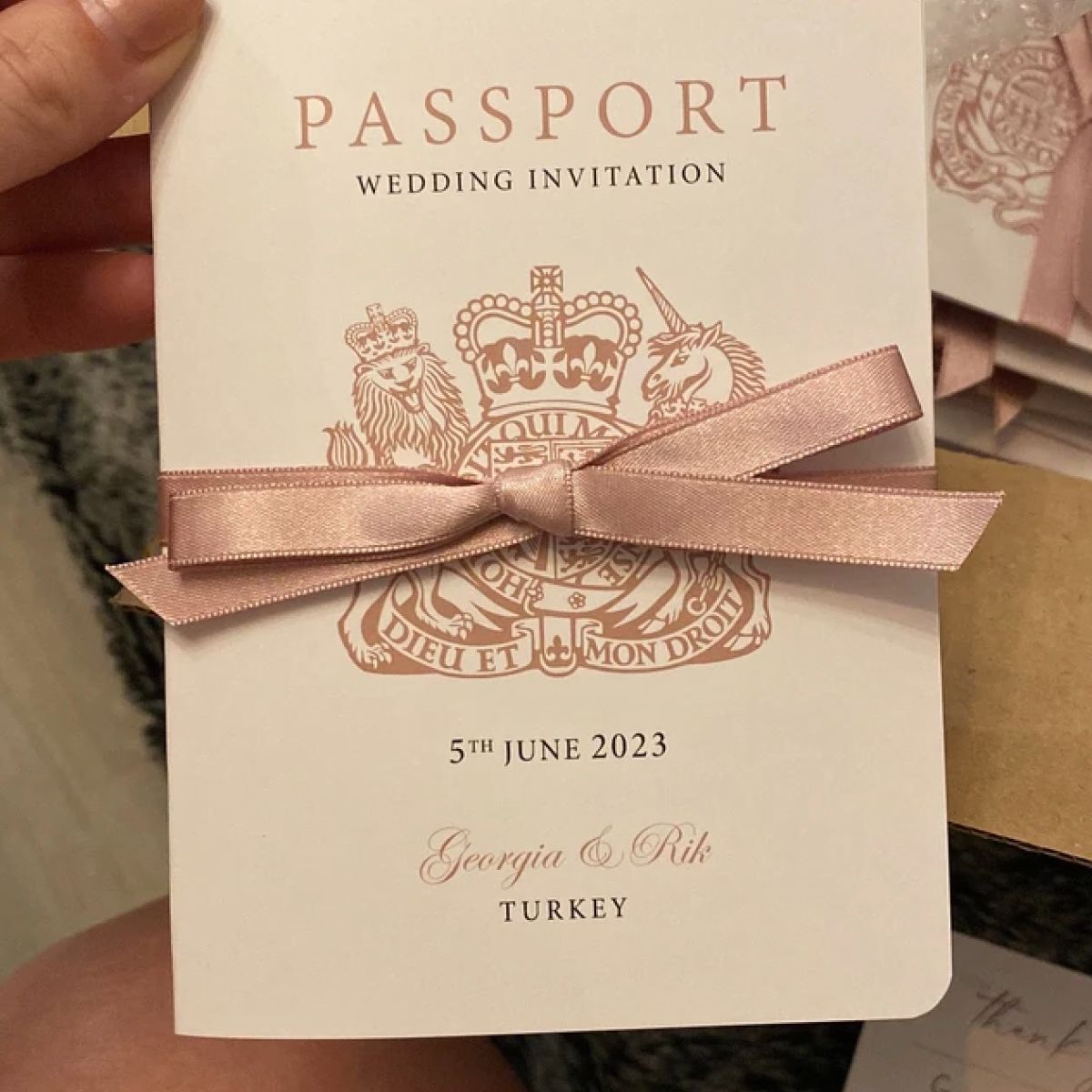 Passport invitations in beautiful rose gold