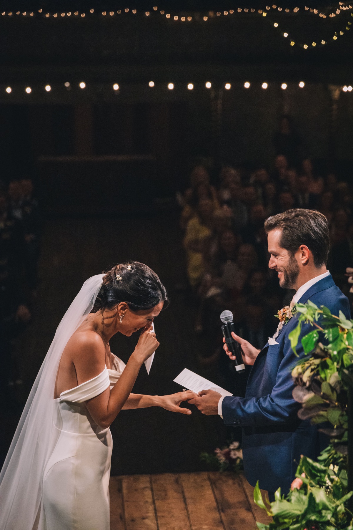 speaking the hand written vows to each other