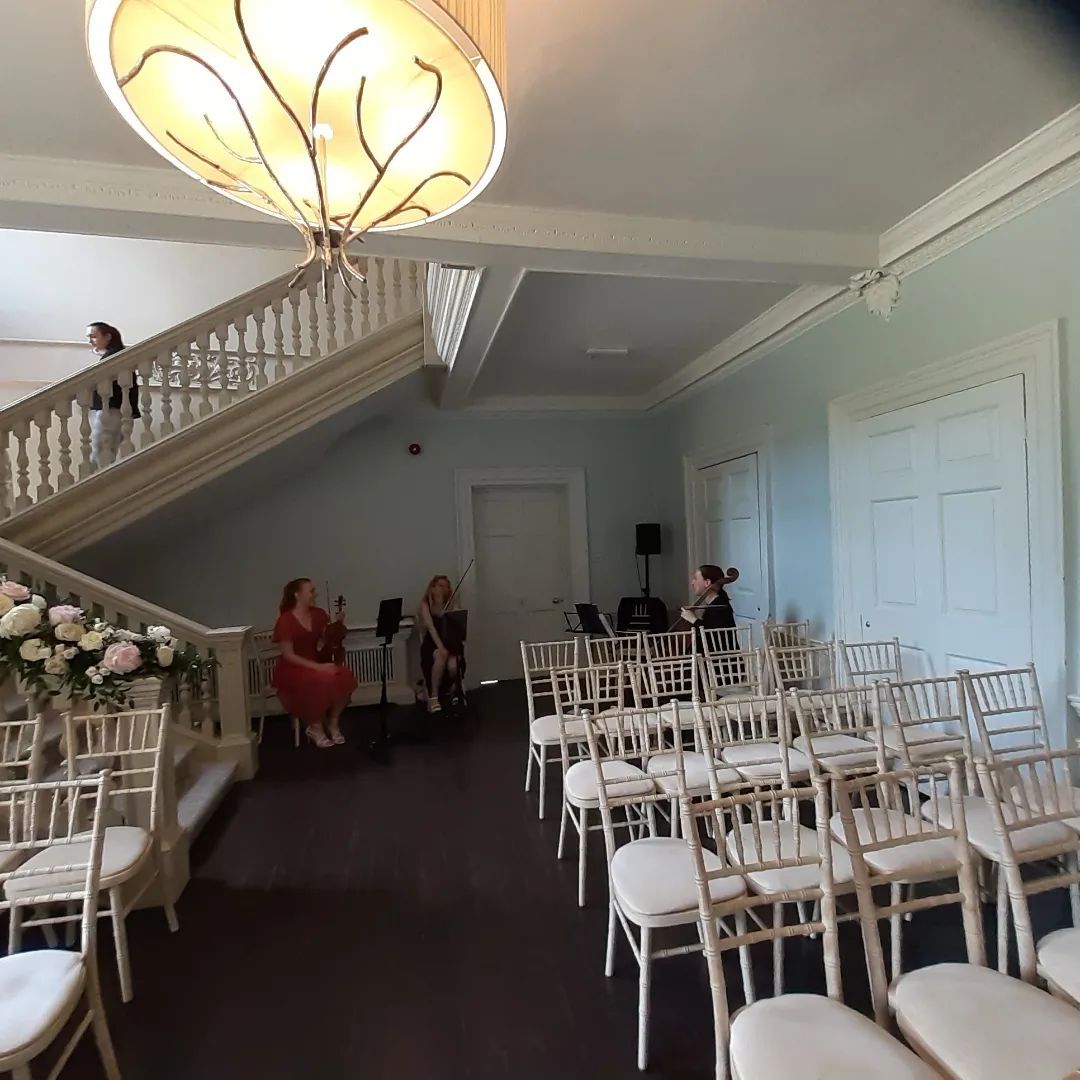 Indoors for the wedding ceremony - Morden Hall's staircase makes for stunning entries.