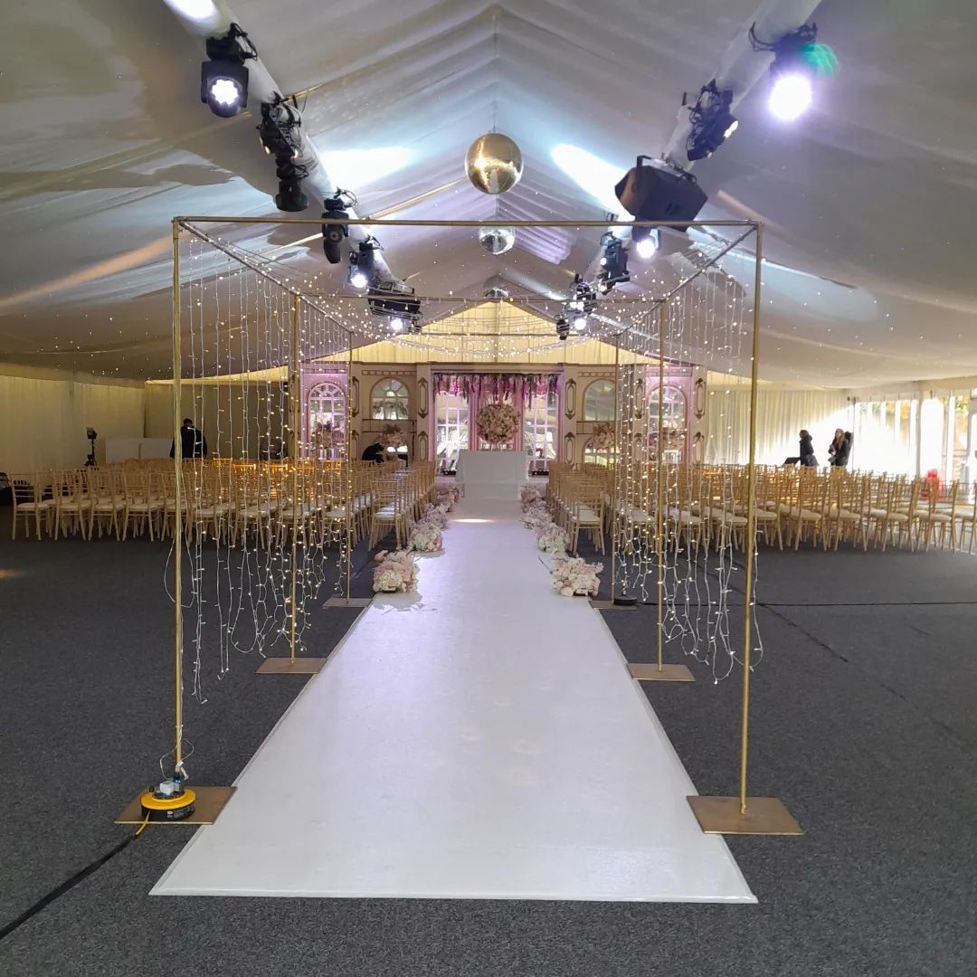 The ceremony took place in this stunningly decorated marquee - we were positioned to the right of the stage as you look at this photo.