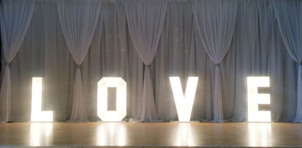 Grecian Swag backdrop with LOVE letters