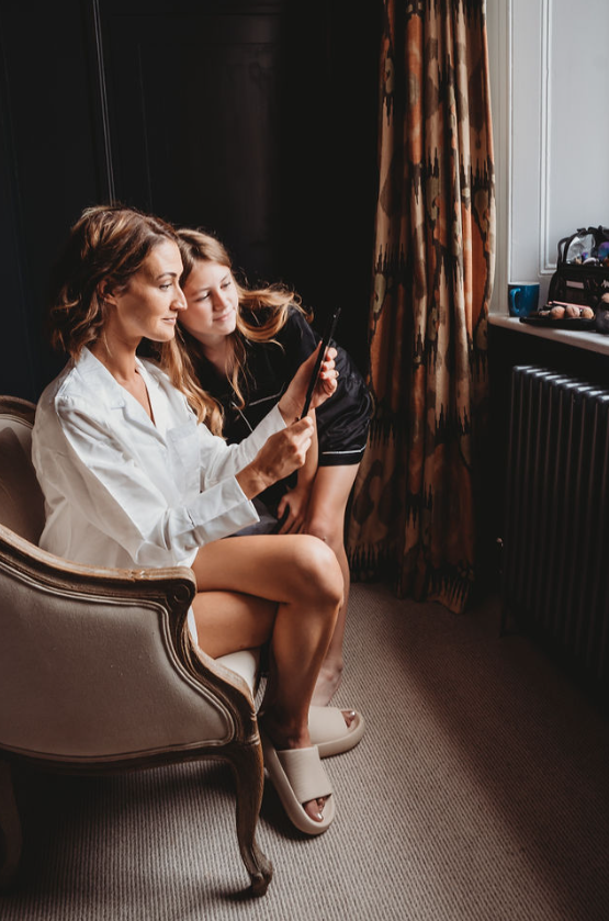 Sophie with their daughter getting ready