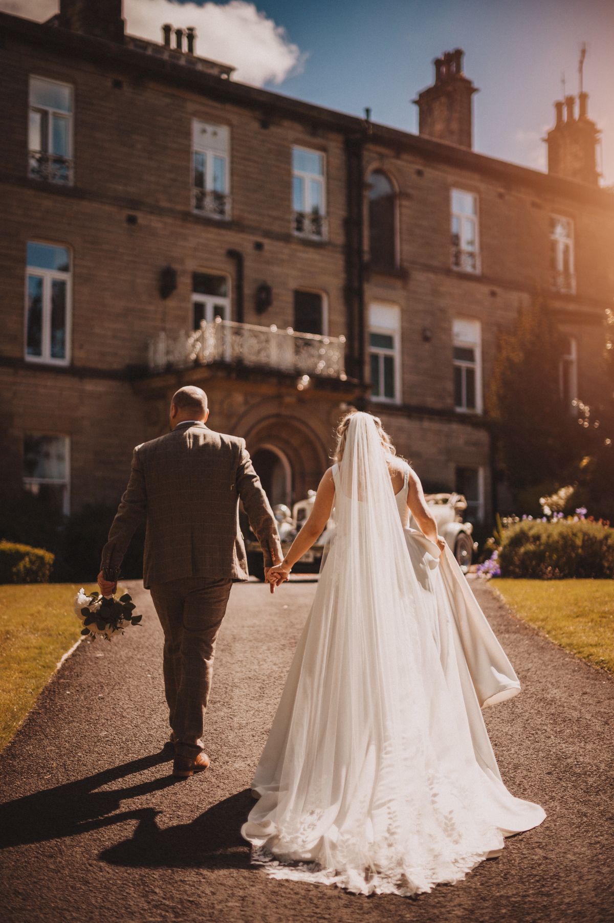 Rachael & Daniel walking towards Astley Bank Hotel