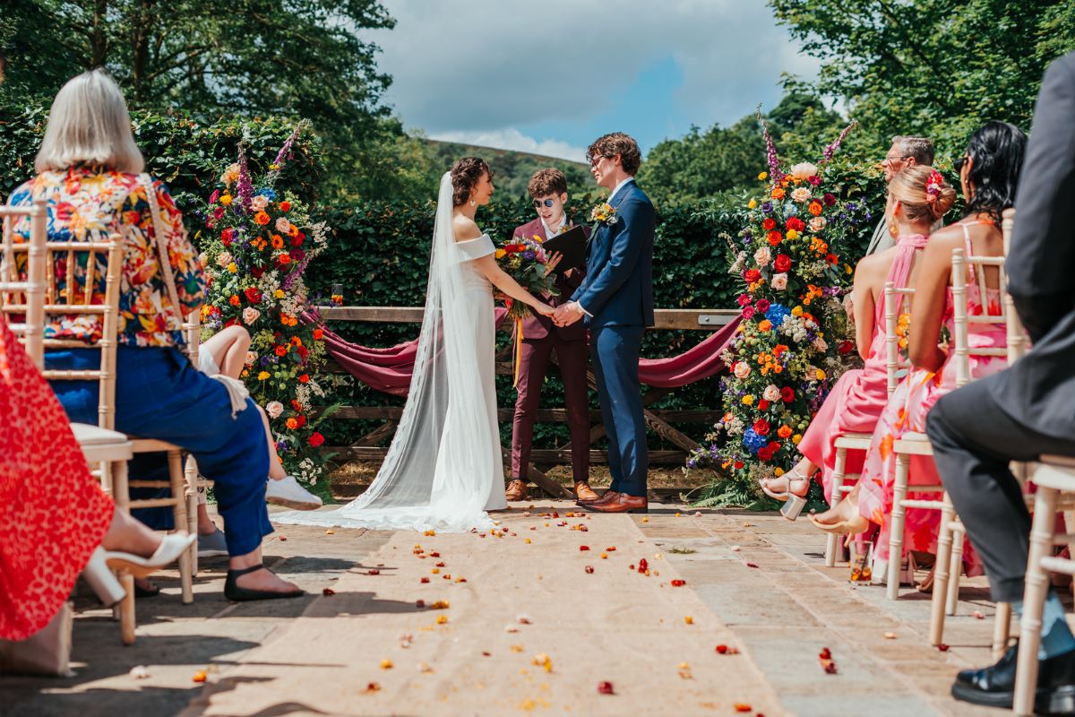 Grace & Hallam said 'I Do' by the river. 