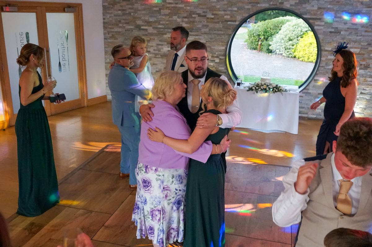 The groom with his mum and sister