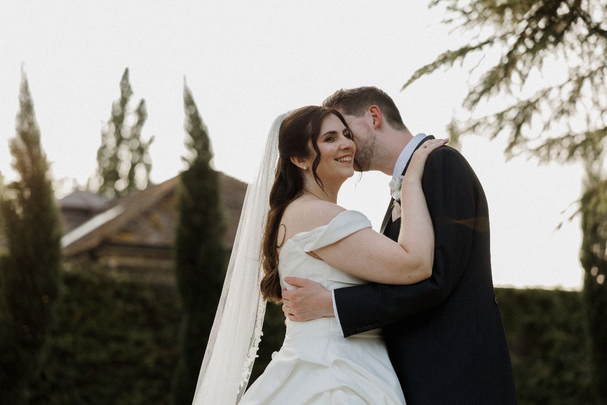 Elizabeth and Andrew on the evening of their wedding at Elmore Court, photographed by Hannah Warmisham