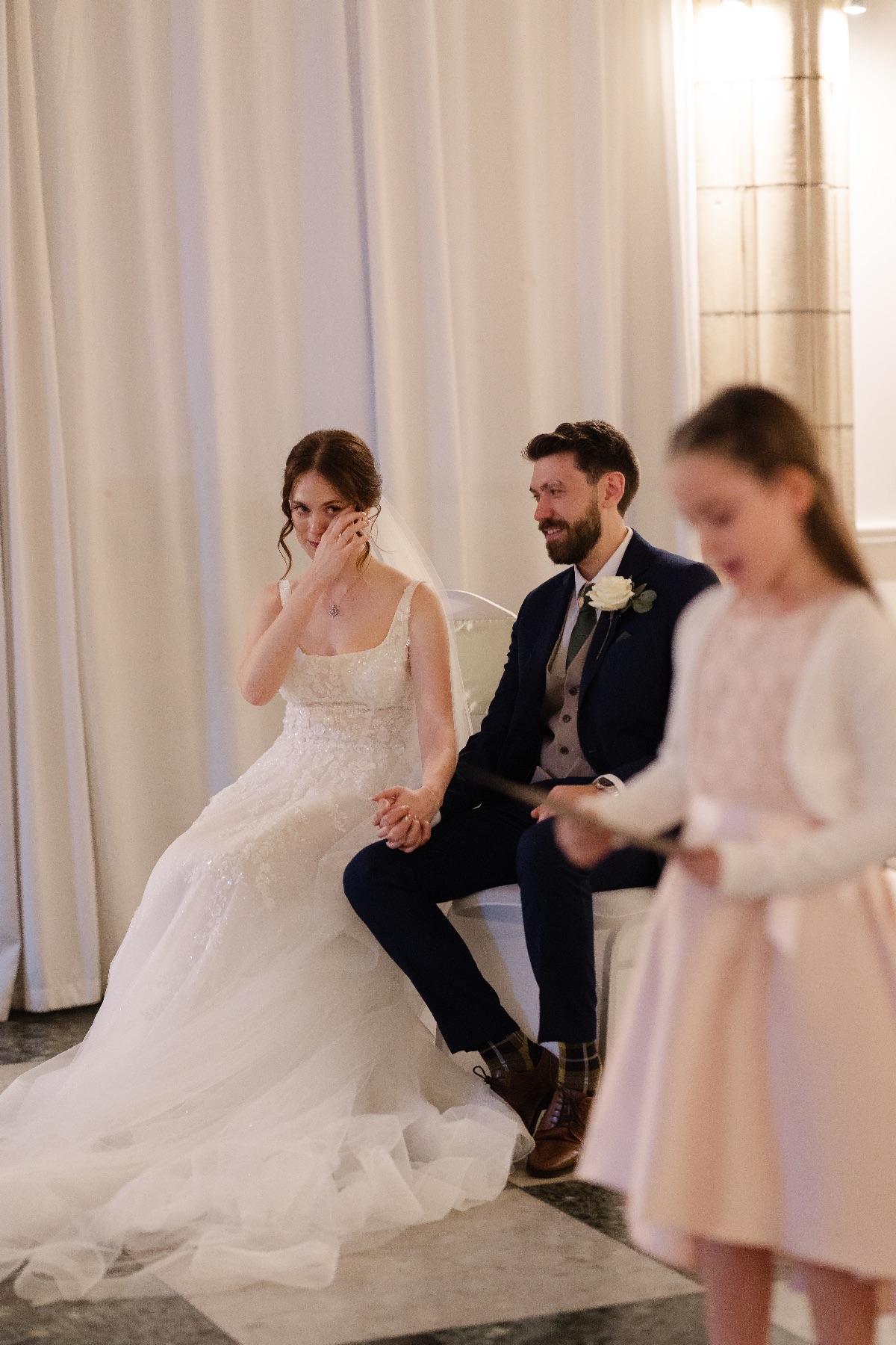 Reading during the ceremony.