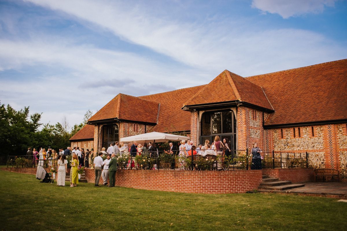 Celebratory drinks on the terrace and lawns behing Cellar door, a real sun trap. 